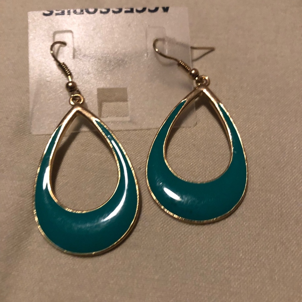 Green earrings trimmed in gold finish.
